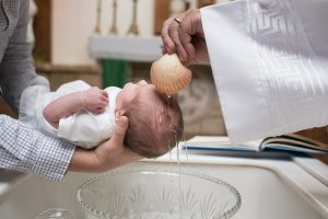 priest-baptizing-baby