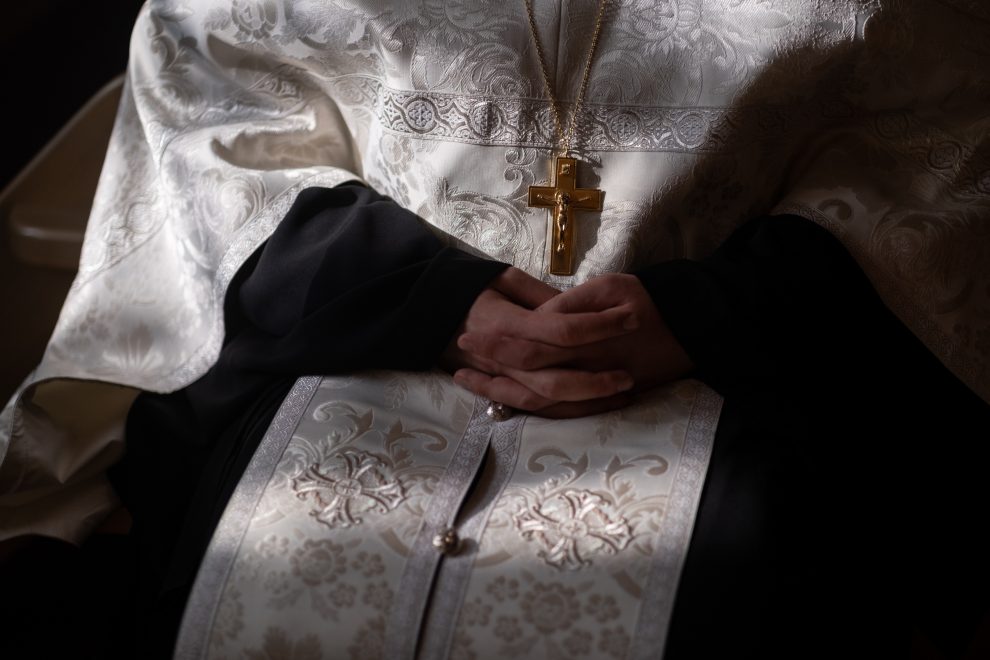 bishops-folded-hands