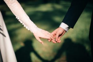 wedding-couple-holding-hands