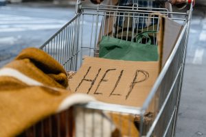 cardboard-sign-with-word-help