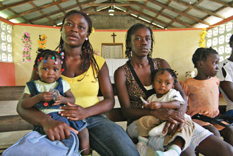Haitian-women-holding-their-chidren