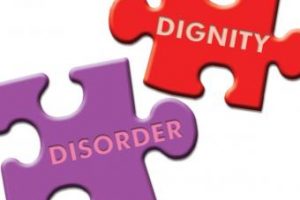 puzzle-pieces-with-the-words-disorder-and-dignity