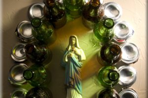 empty-cans-surround-mary-statue