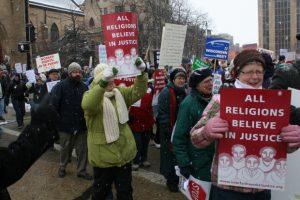 Madison-clergy-march-with-signs