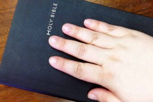 hand-on-a-bible