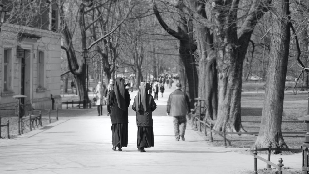 women-religious-walking-on-path