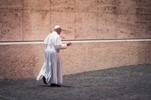 pope-francis-walks-against-wall