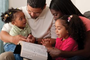 family-reading-bible-together
