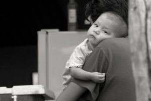 child-resting-on-mothers-shoulder