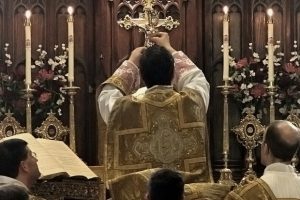 bishop-holding-eucharist