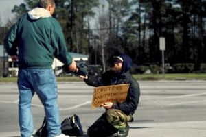 homeless-person-receiving-donation
