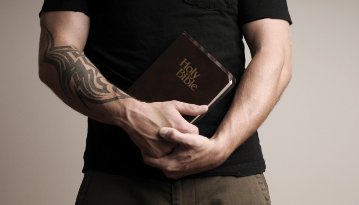 man-holding-bible