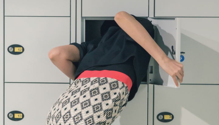 woman-with-her-head-in-a-locker