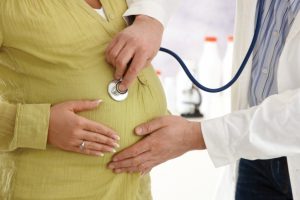 stethoscope-on-pregnant-womans-belly