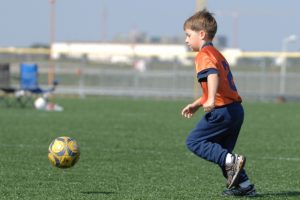 kid-playing-soccer