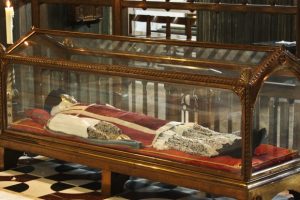 relic-robes-in-glass-coffin