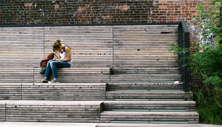student-sitting-on-steps