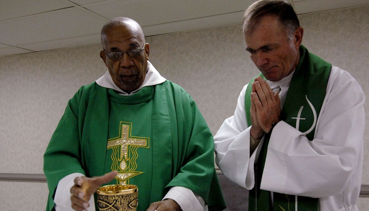 two-priests-wearing-green