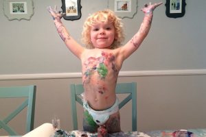 baby-covered-in-fingerpaint