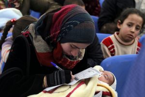 refugee-mother-hugs-her-baby