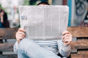 man-reading-newspaper