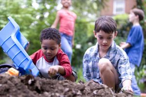 white-boy-and-black-boy-playing-outside