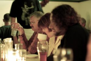 family-dining-at-long-table