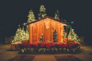 U.S. Catholic magazine outdoor nativity scene at night during Advent