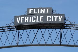 sign-reading-flint-vehicle-city