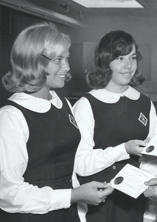 two-teenage-girls-wearing-uniforms