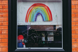 window-with-drawing-of-rainbow-in-it