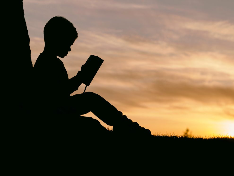 silhouette-of-child-reading