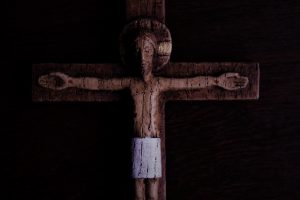 wooden-crucifix-dimly-lit