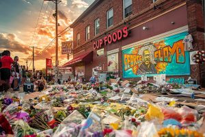 Flowers-and-tributes-in-front-Cup-Foods-Minneapolis-where-George-Floyd-killed