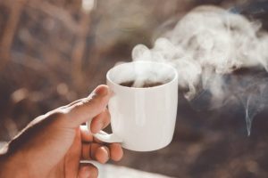 coffee-cup-with-steam-by-window