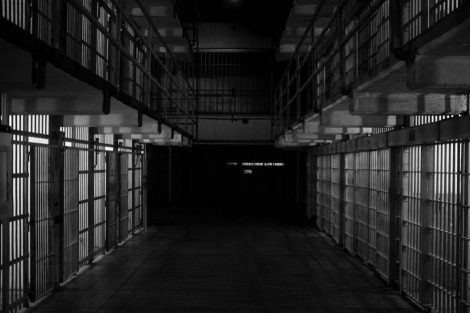 empty-hallway-of-prison-cells