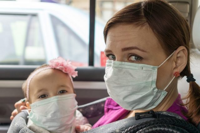 woman-and-child-wearing-surgical-mask