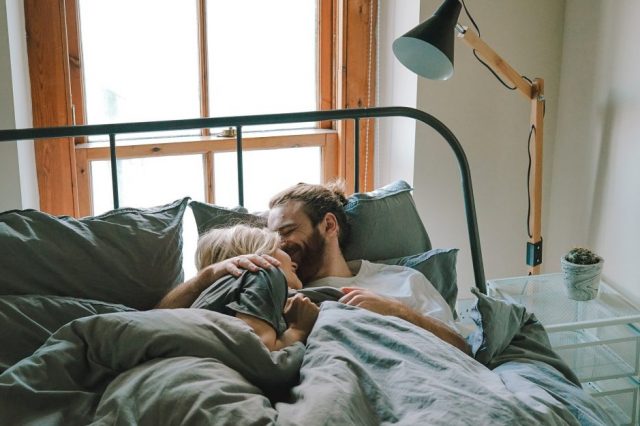 man-and-woman-lying-in-bed