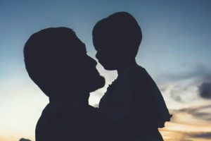 silhouette-of-father-holding-child