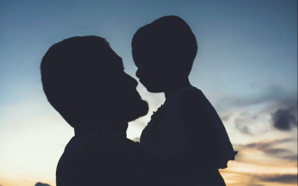 silhouette-of-father-holding-child