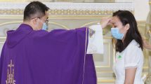 young-person-receiving-sacrament-of-confirmation