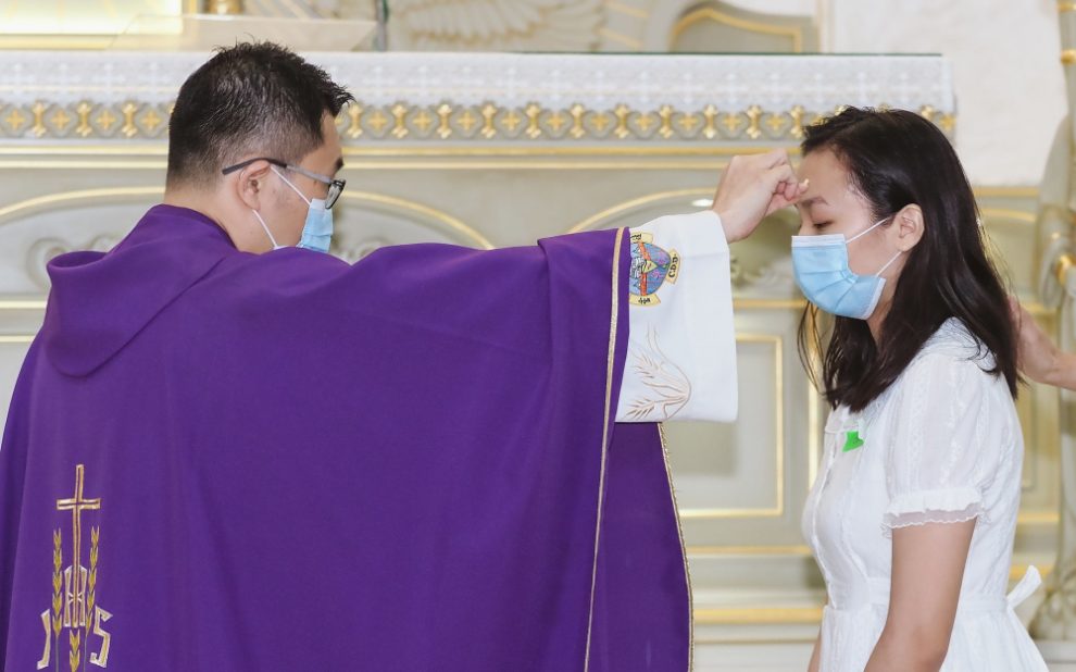 young-person-receiving-sacrament-of-confirmation