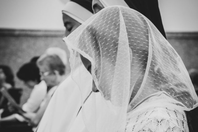 girl-wearing-a-veil-in-church