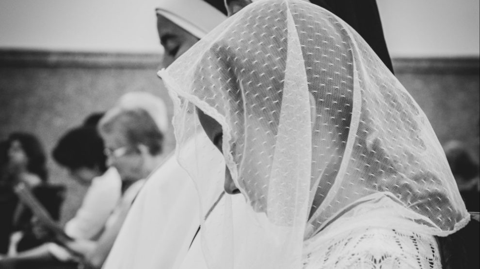 girl-wearing-a-veil-in-church