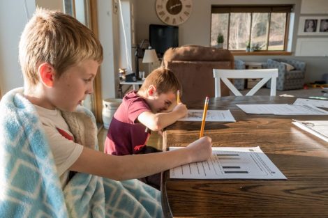 two-children-being-homeschooled