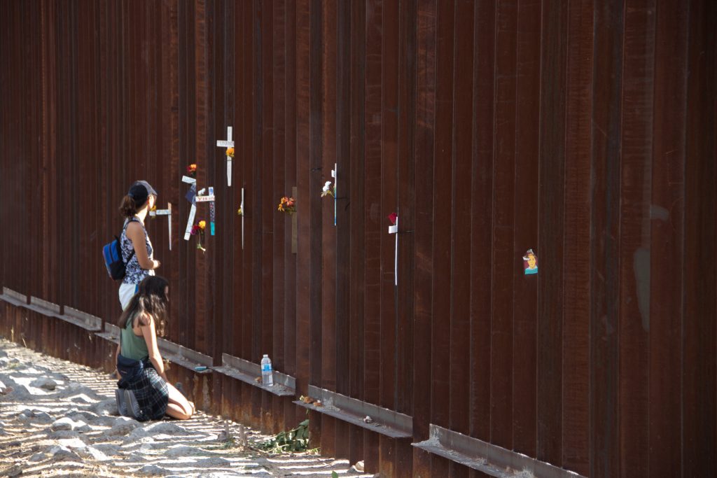 people-wait-at-united-states-mexico-border