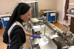 nun-makes-communion-bread-wafers-by-hand