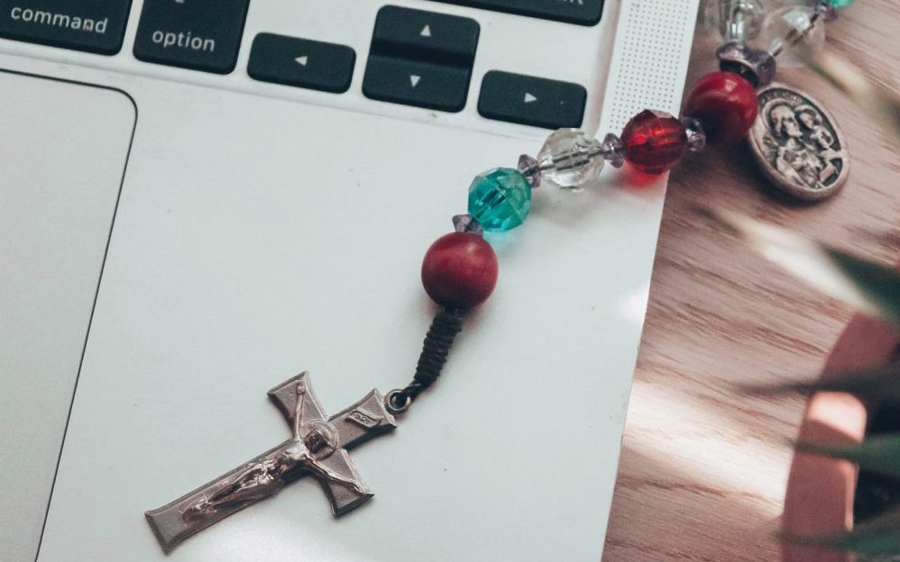 rosary-on-computer-keyboard