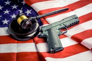 gun-flag-and-judges-gavel