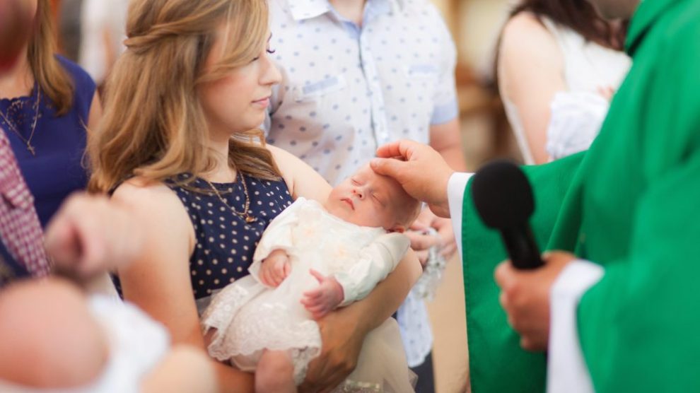 baby-being-blessed-at-mass